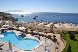 4 piscinas al aire libre, sombrillas, tumbonas