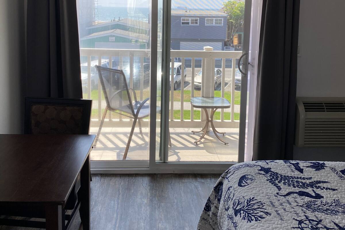 deluxe room, 2 queen beds, ocean view | 1 bedroom, desk, blackout curtains, iron/ironing board