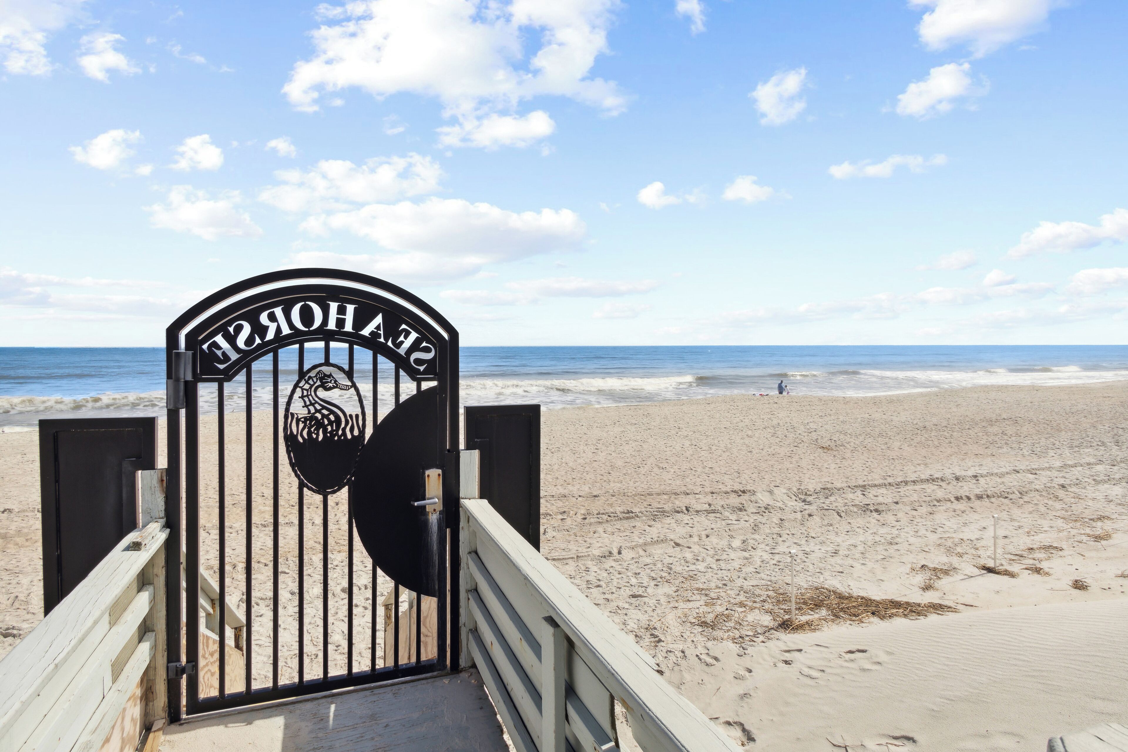 On the beach, white sand, beach towels