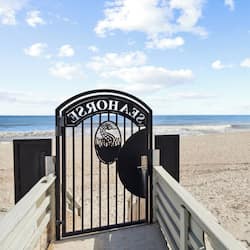 On the beach, white sand, beach towels
