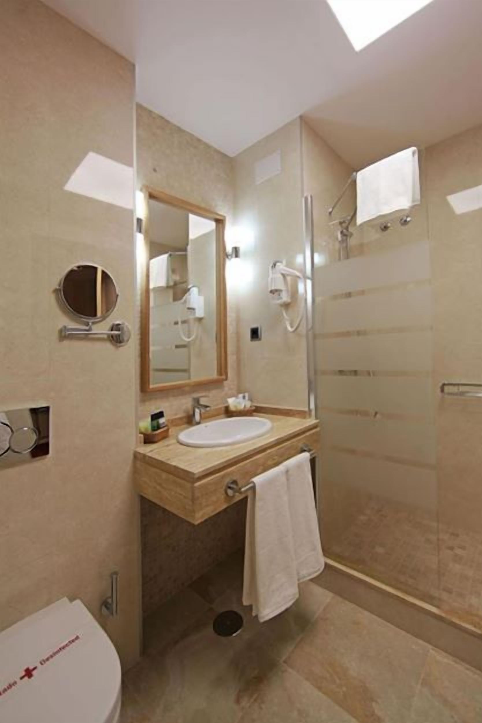 shower, free toiletries, hair dryer, bathrobes