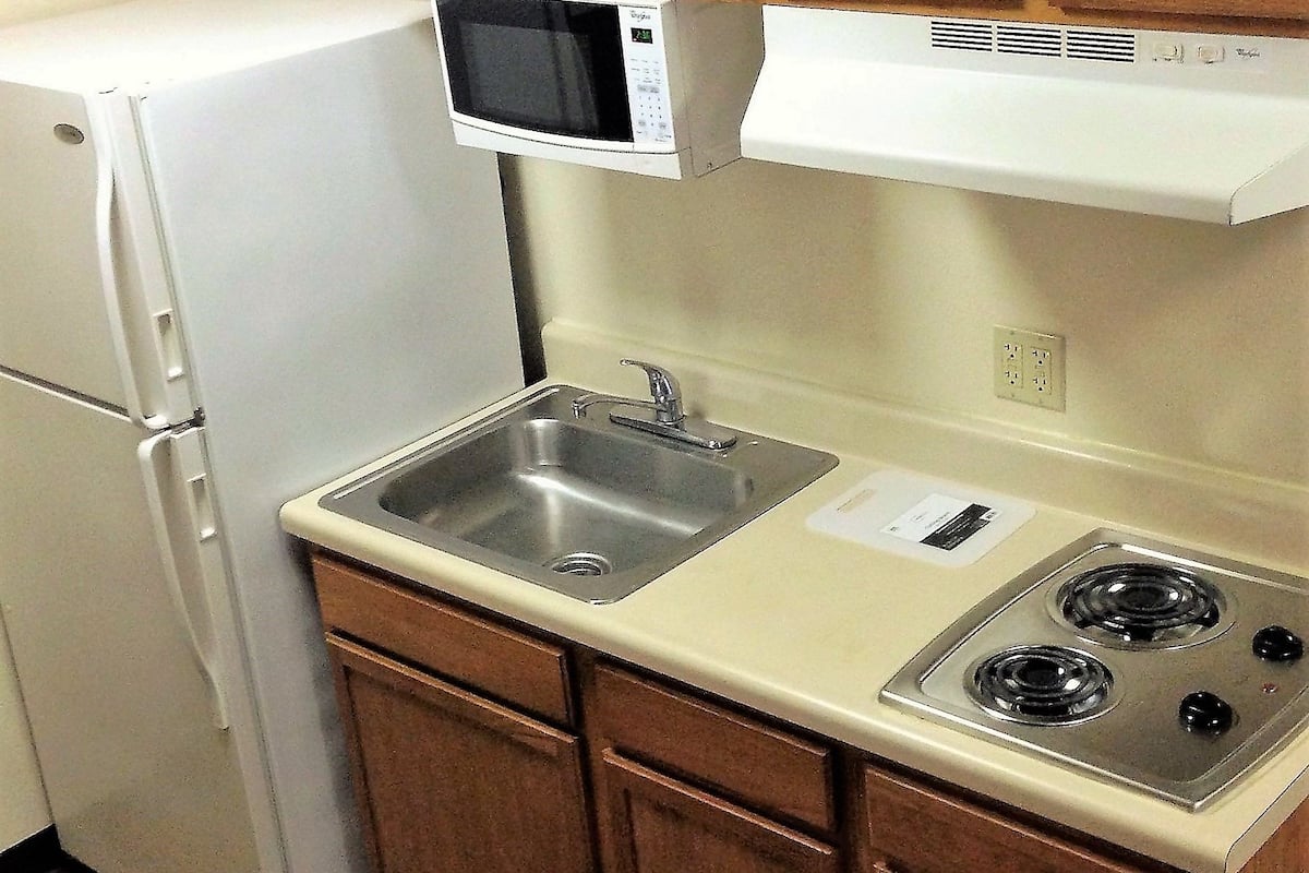 full-sized fridge, microwave, stovetop