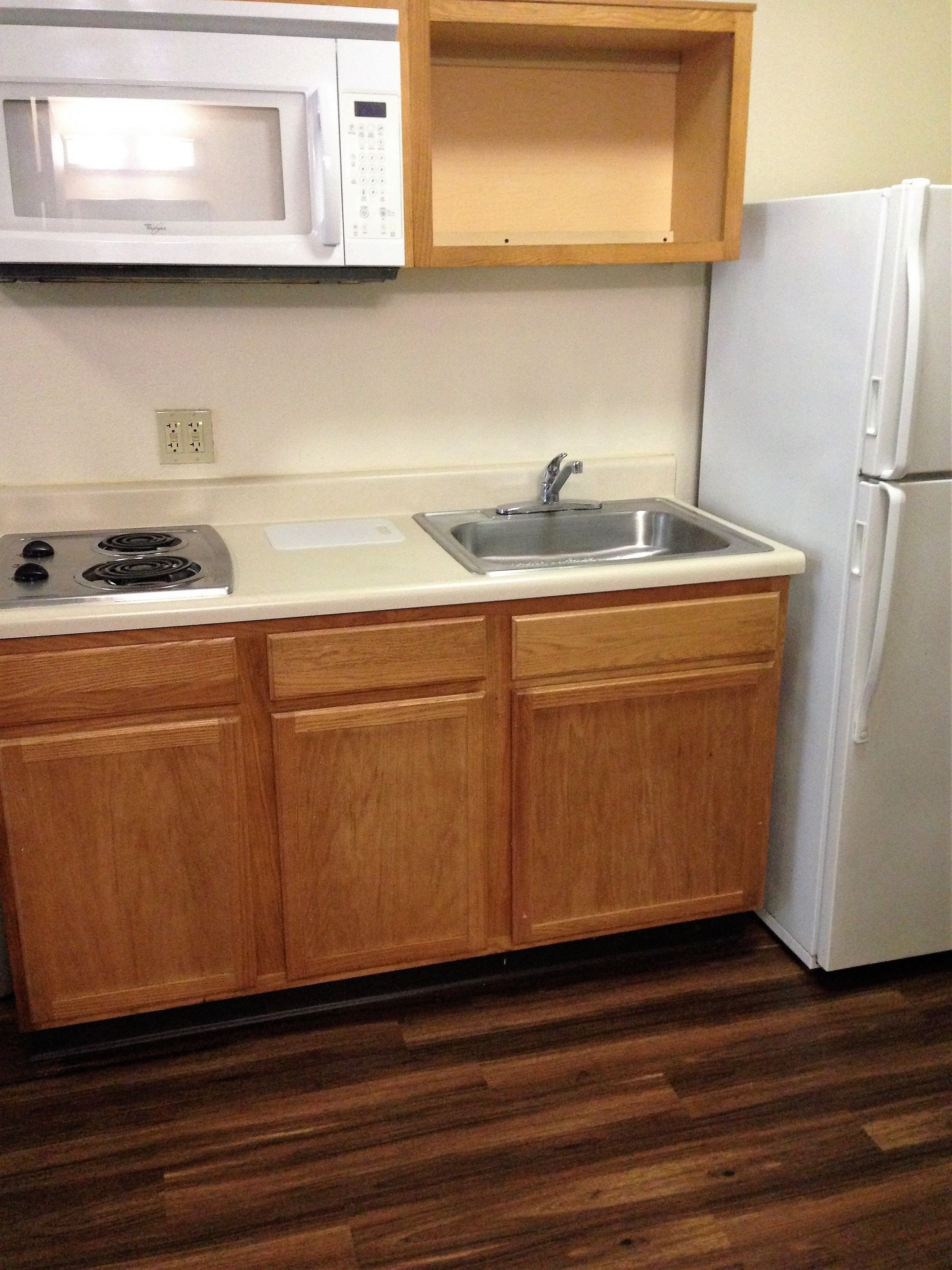 full-sized fridge, microwave, stovetop