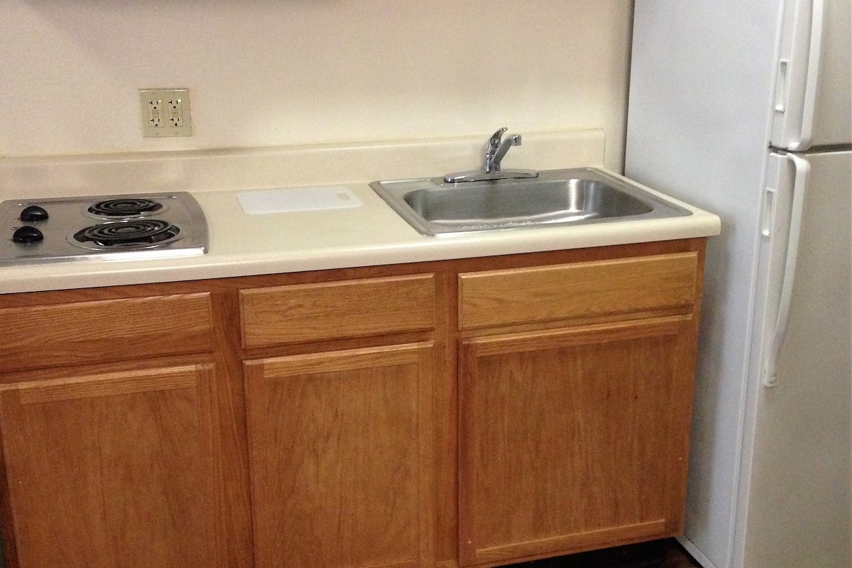 full-sized fridge, microwave, stovetop