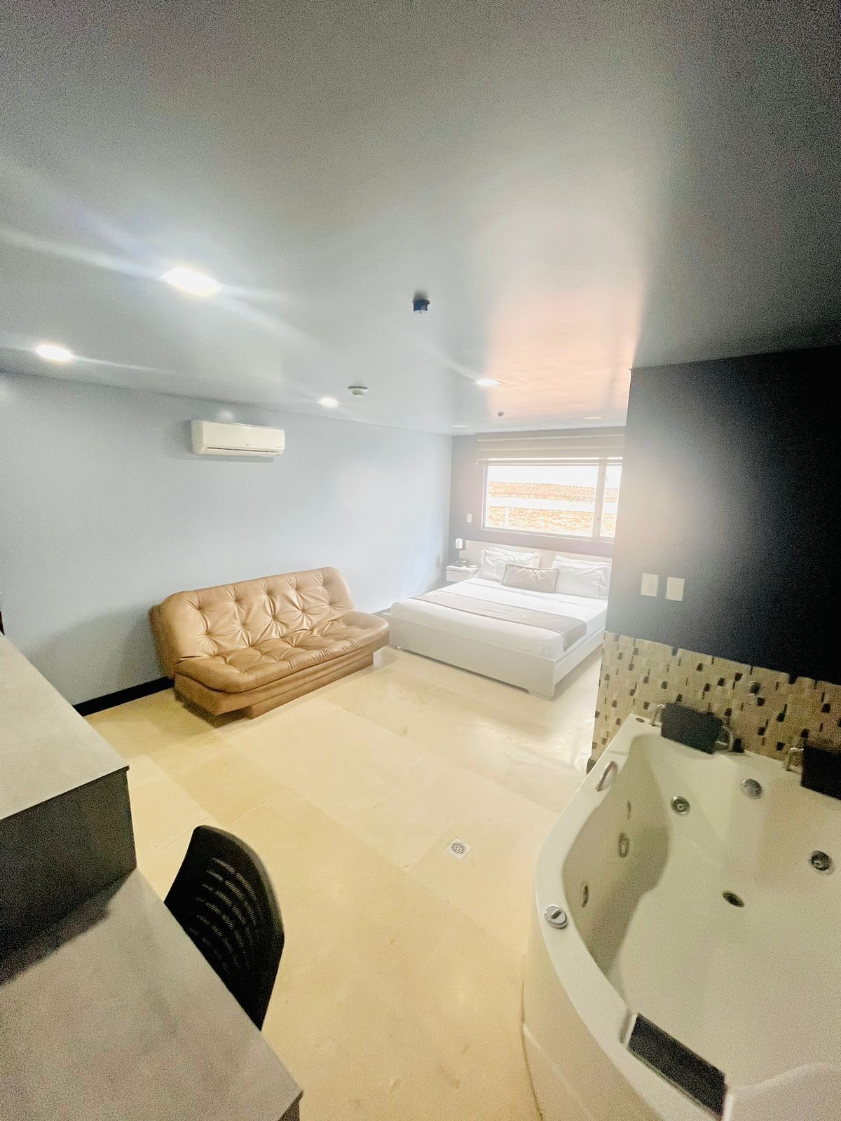 Suite, Jetted Tub | Minibar, in-room safe, blackout drapes, soundproofing