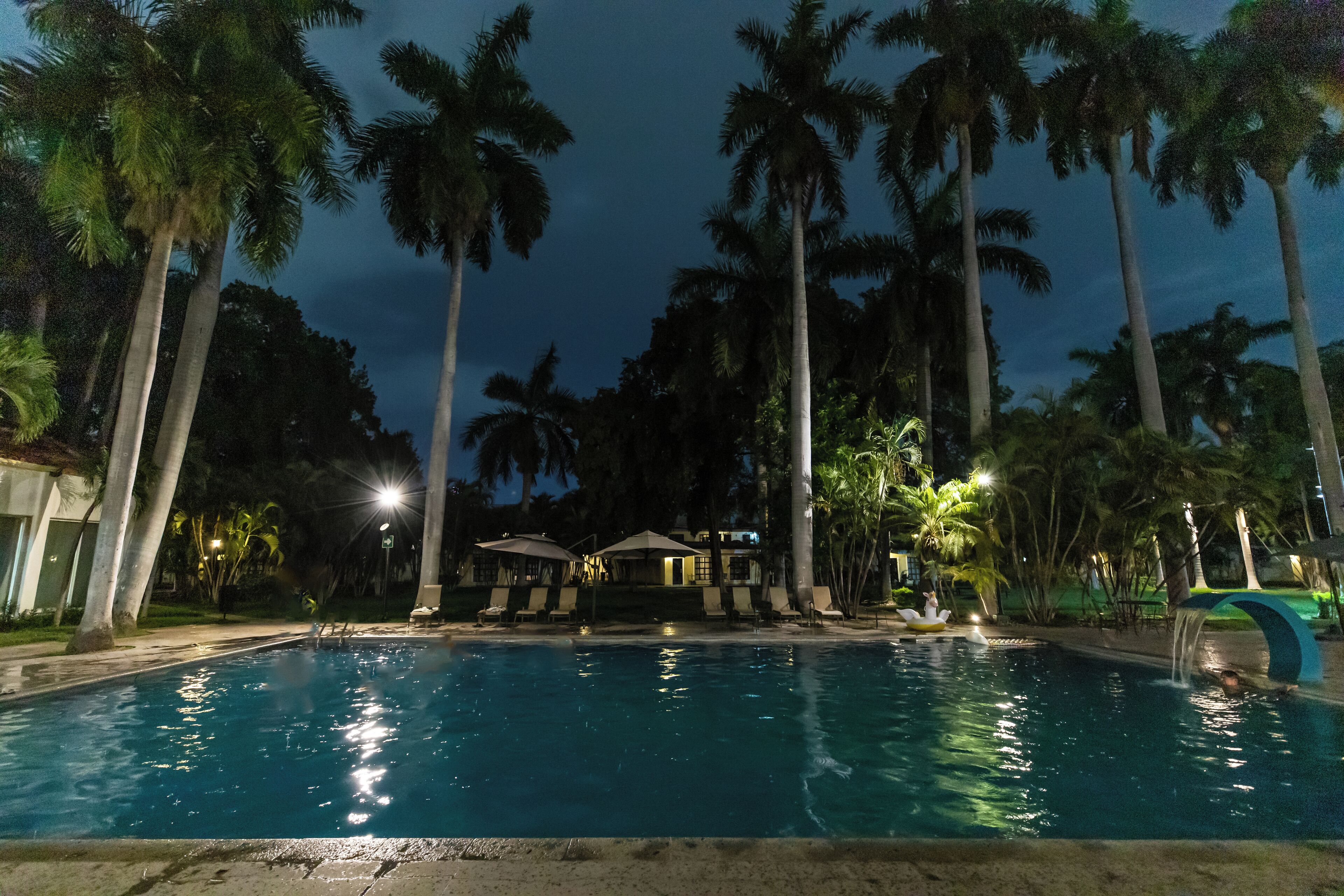 outdoor pool, pool umbrellas, pool loungers