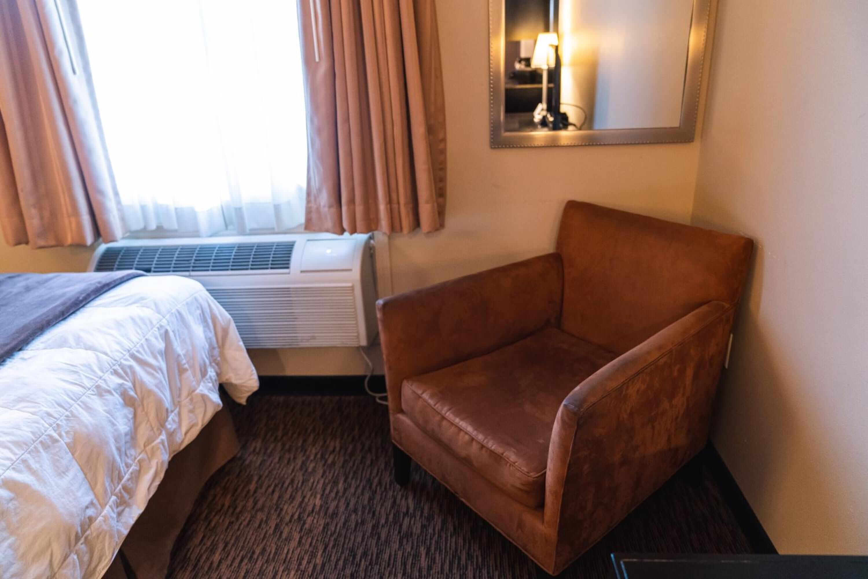 premium bedding, desk, blackout curtains, iron/ironing board