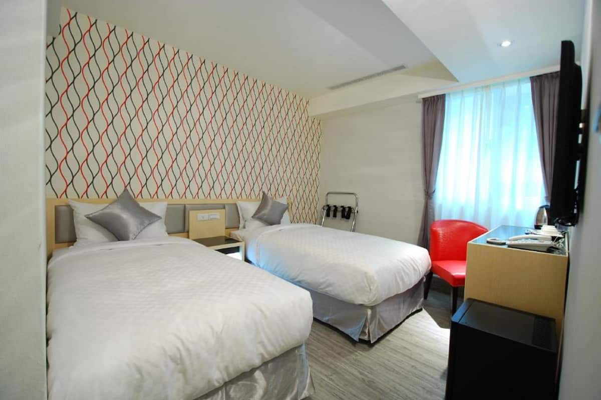 Desk, blackout curtains, free WiFi, bed sheets