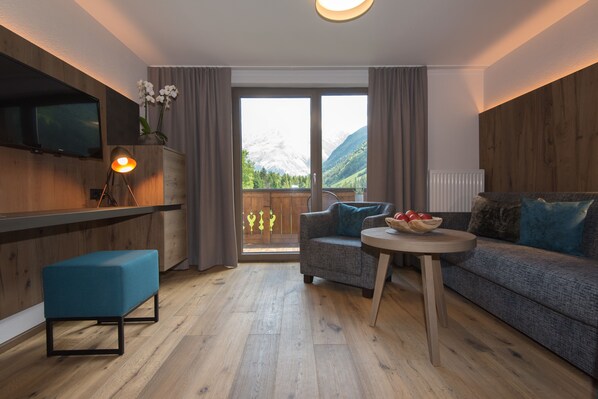 Suite (Sonnblick) | Wohnbereich | Flachbildfernseher