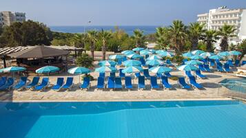 Outdoor pool, free pool cabanas, pool umbrellas