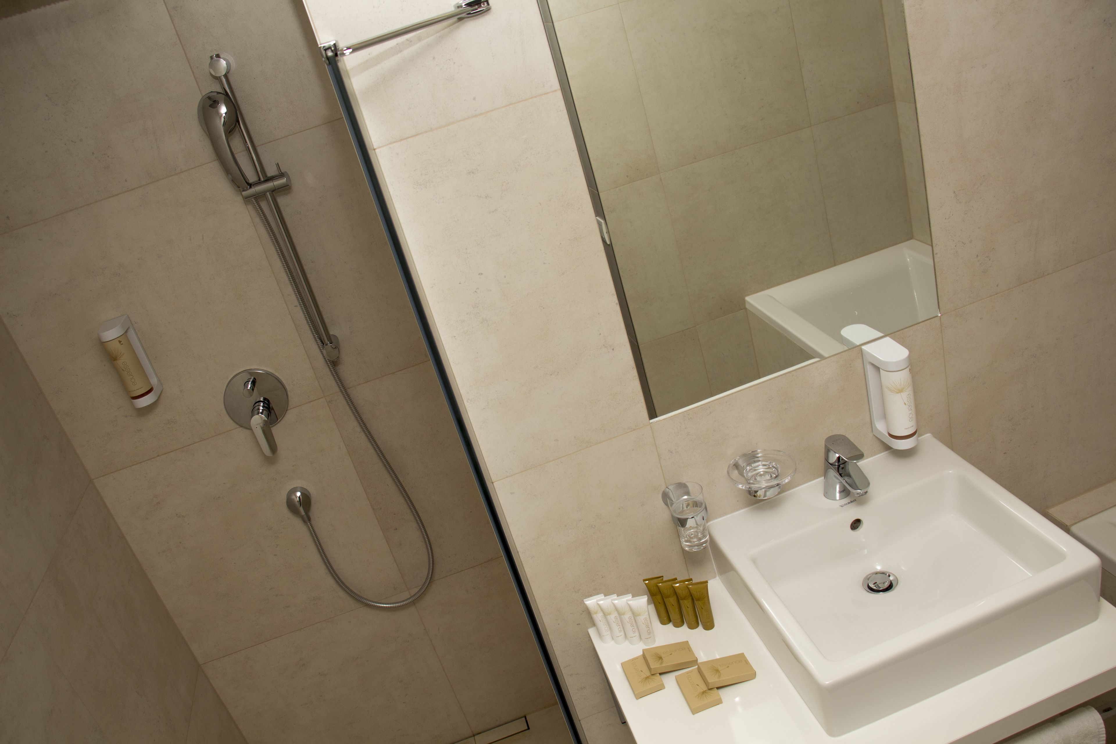 design suite, 2 bedrooms, city view | bathroom | shower, rainfall showerhead, designer toiletries, hair dryer