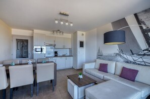Appartement | Salle de séjour | Télévision à écran plat