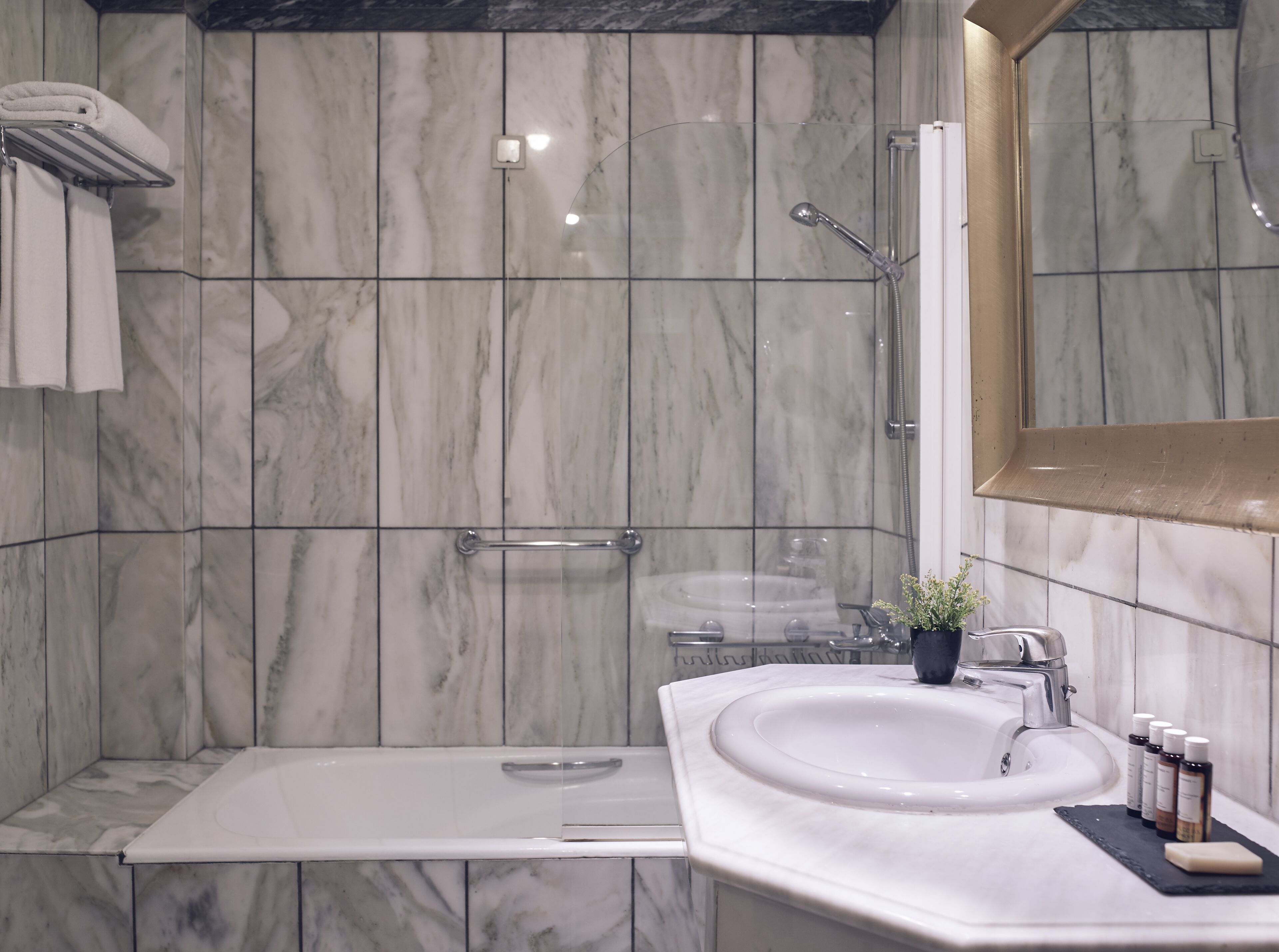 bathtub, free toiletries, hair dryer, bathrobes