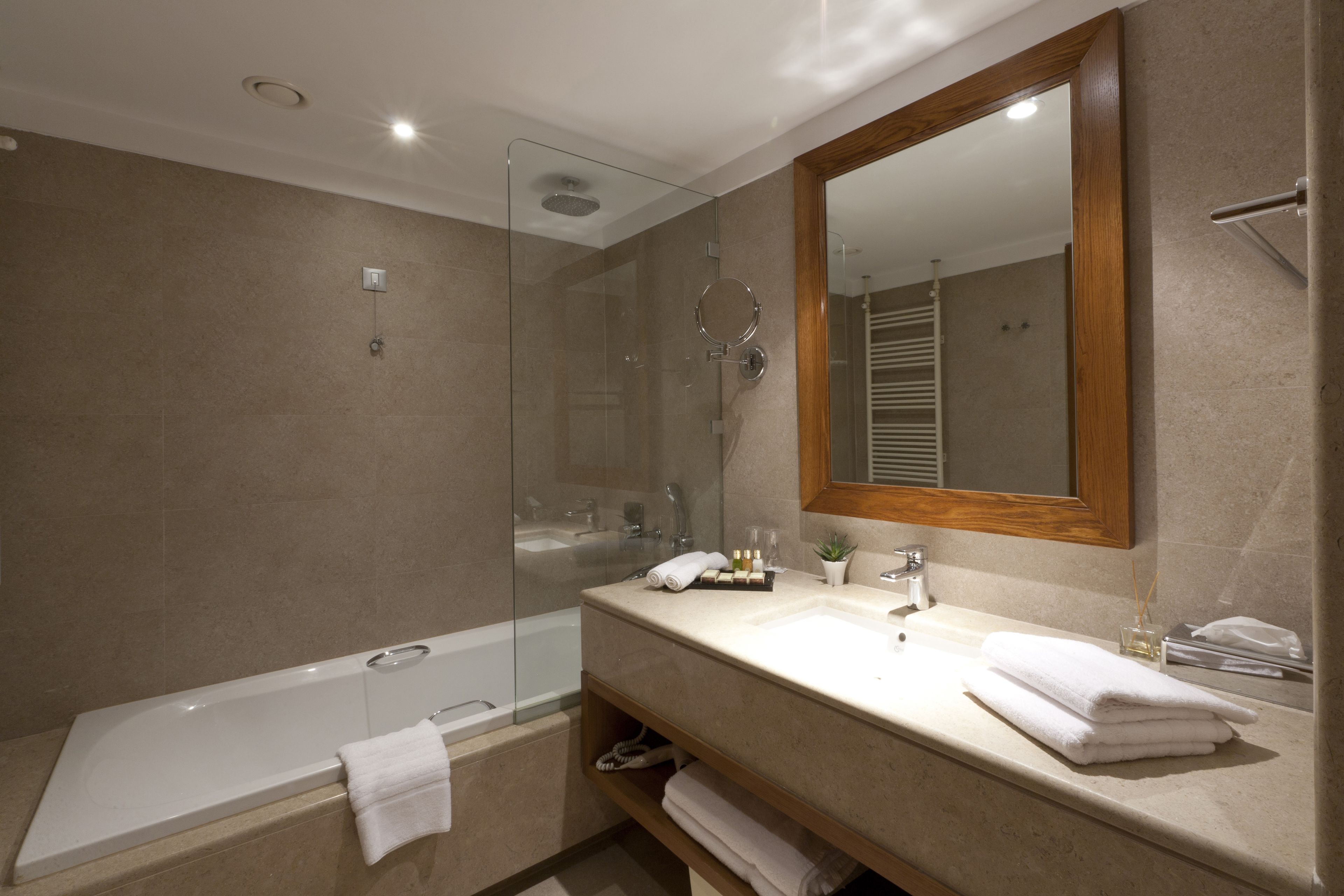 bathtub, free toiletries, hair dryer, bathrobes