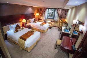 Ropa de cama de alta calidad y minibar