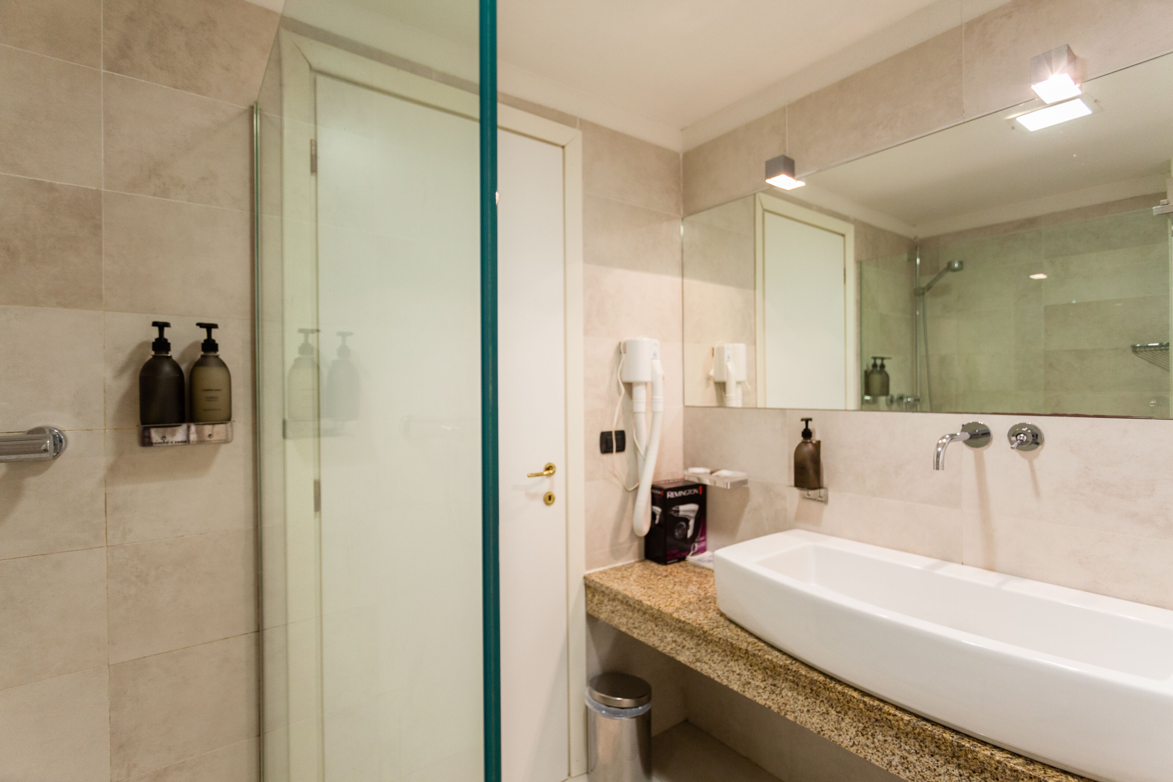 shower, free toiletries, hair dryer, towels