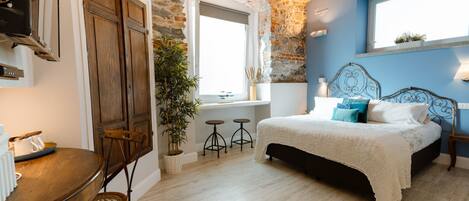 Deluxe Double or Twin Room | Down duvets, free minibar items, in-room safe, individually decorated