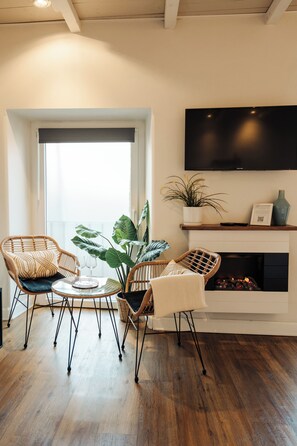 Romantisk studiosvit - bastu | Duntäcken och minibar med vissa gratis produkter