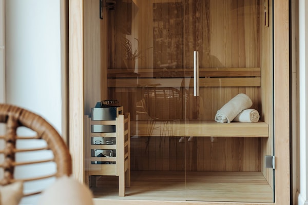 Suite monolocale Romantica, sauna | Copriletto in piuma, minibar (con alcuni snack e alcune bevande gratis)