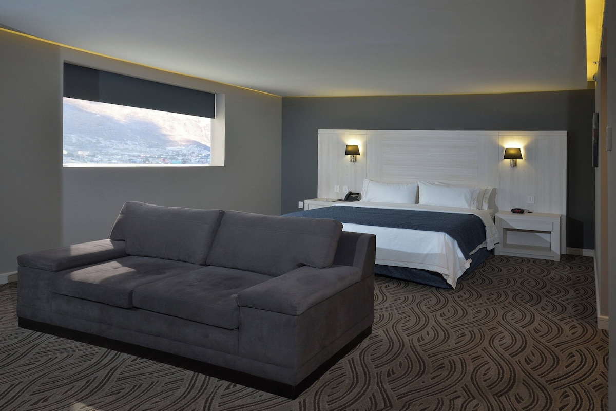 Suite, 1 King Bed | 1 bedroom, in-room safe, desk, blackout drapes