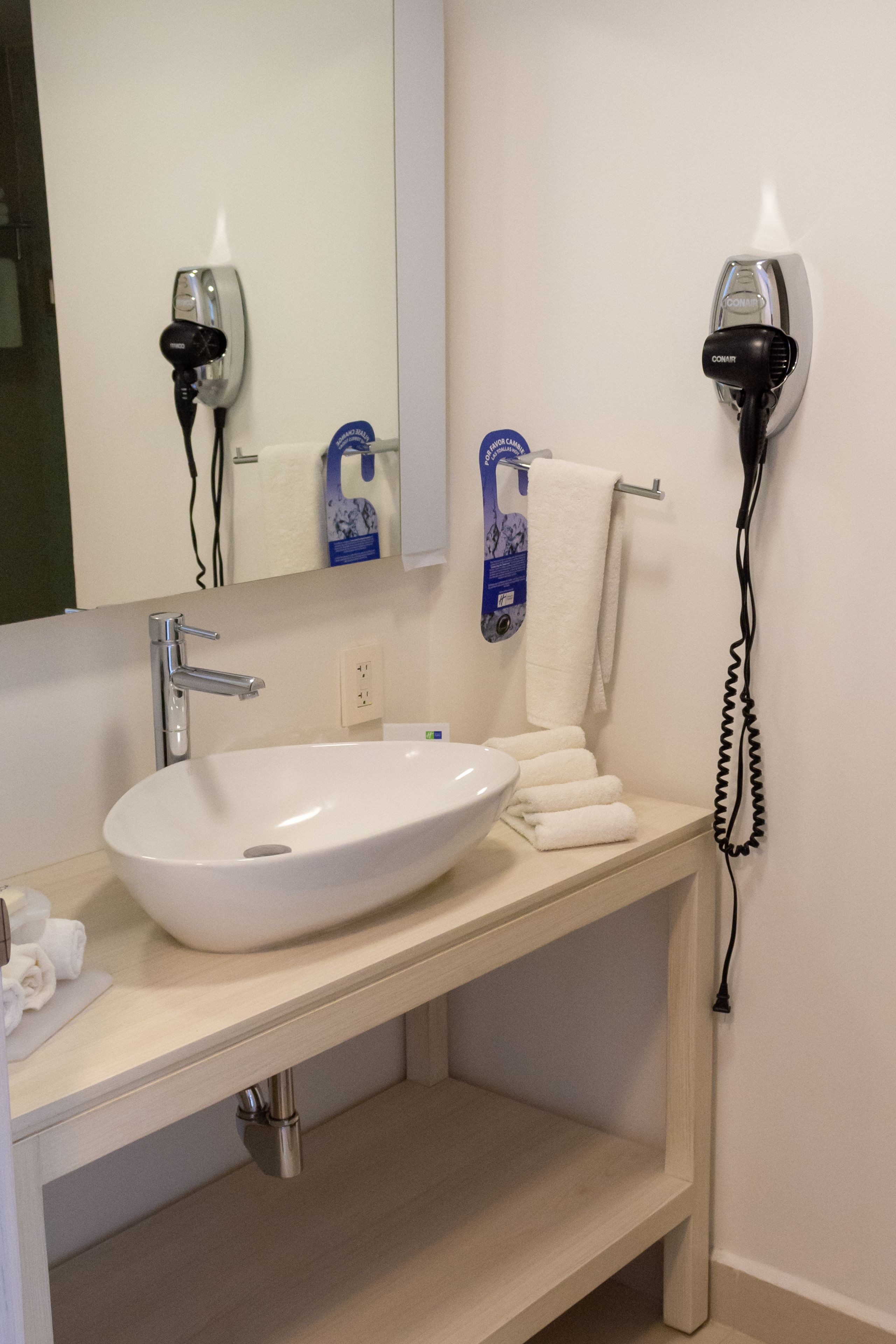 rainfall showerhead, hair dryer, towels, soap