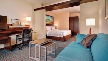 Studio, 1 King Bed with Sofa bed | Living area | 48-inch TV with satellite channels, streaming services