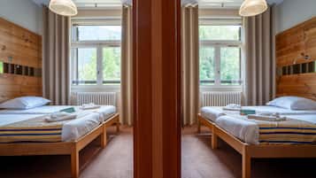 Economy Suite, 1 Bedroom, Private Bathroom | 1 bedroom, blackout drapes, iron/ironing board, bed sheets