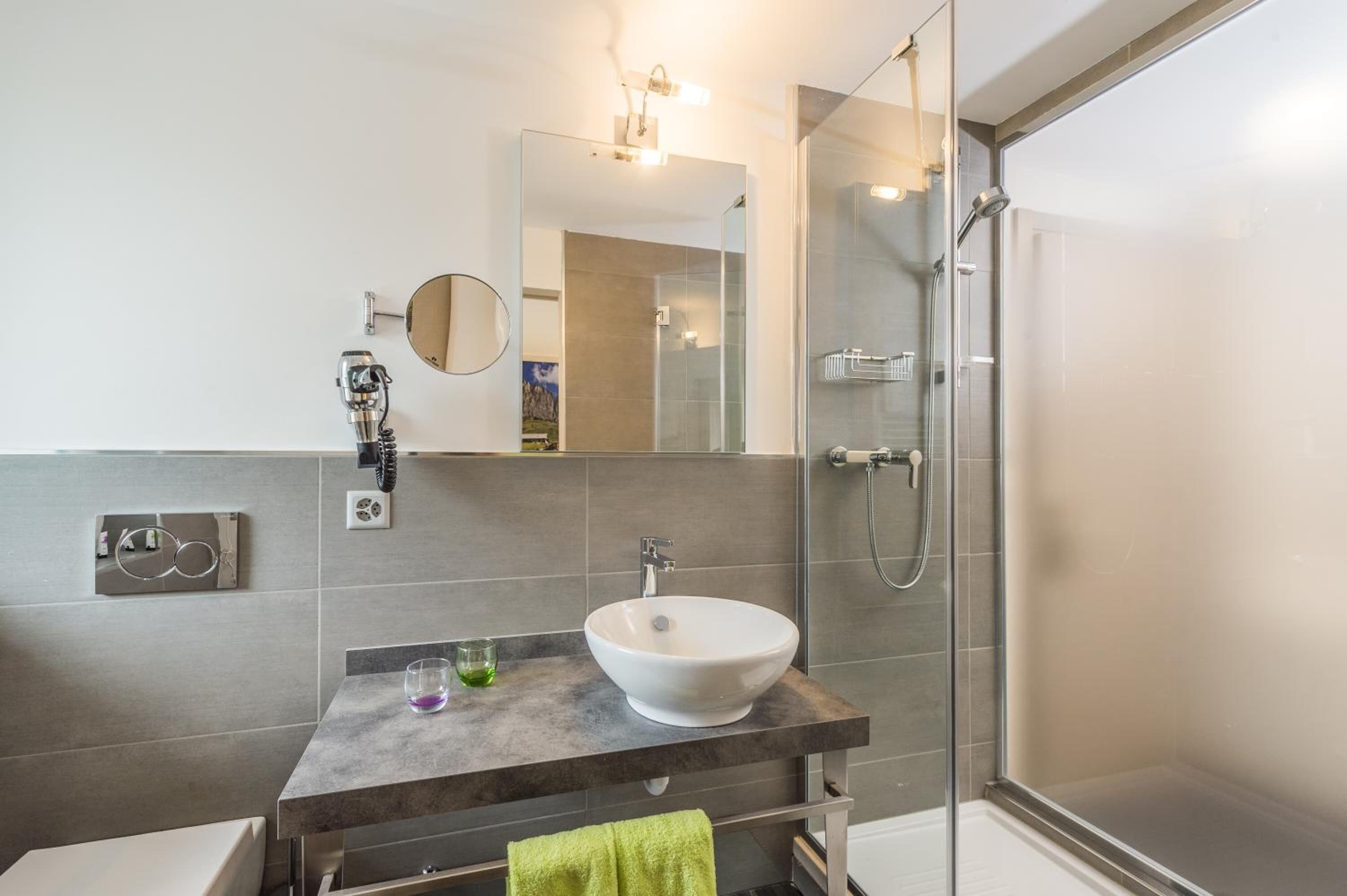 shower, free toiletries, hair dryer, slippers