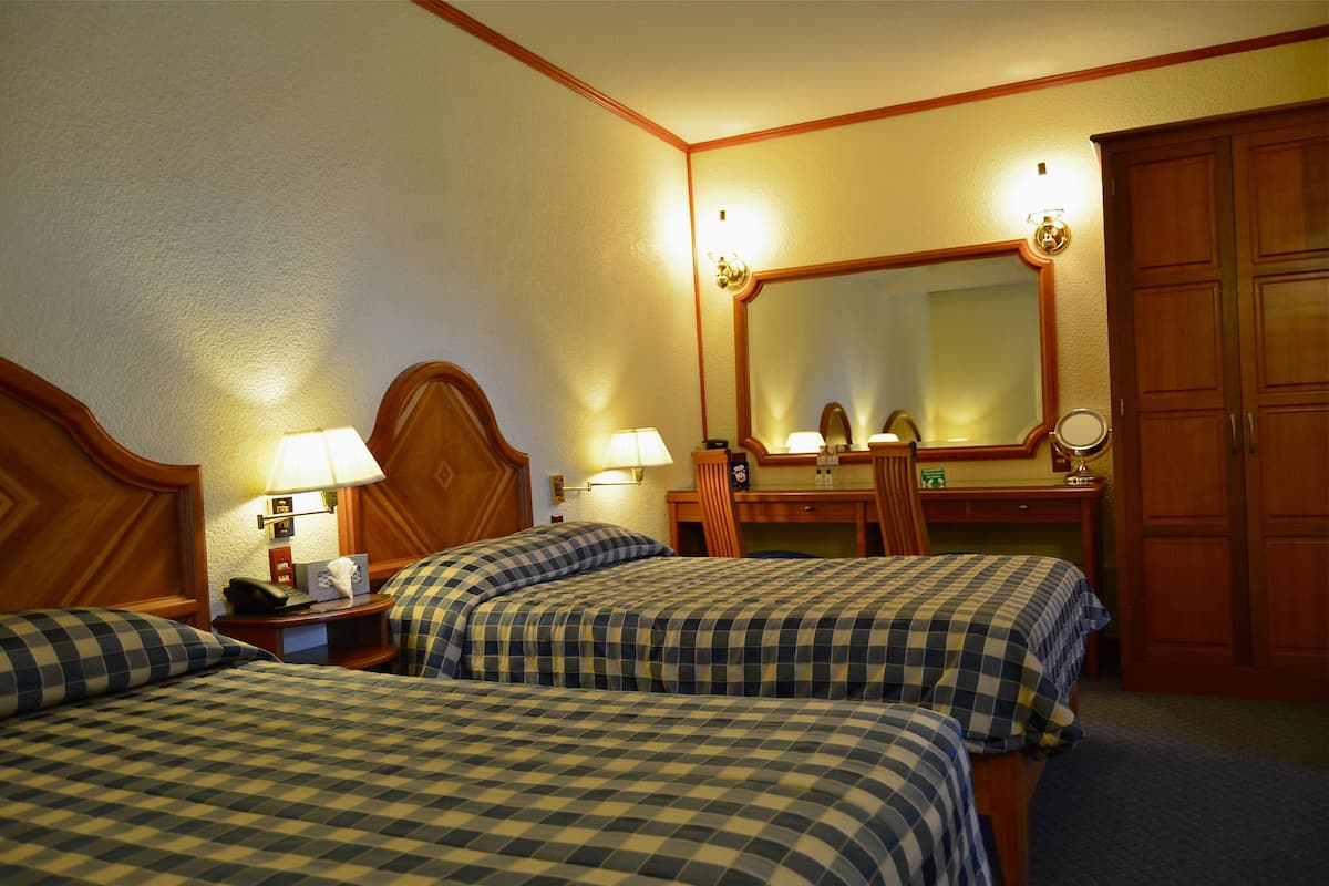 Quadruple Room | Premium bedding, pillow-top beds, in-room safe, blackout curtains