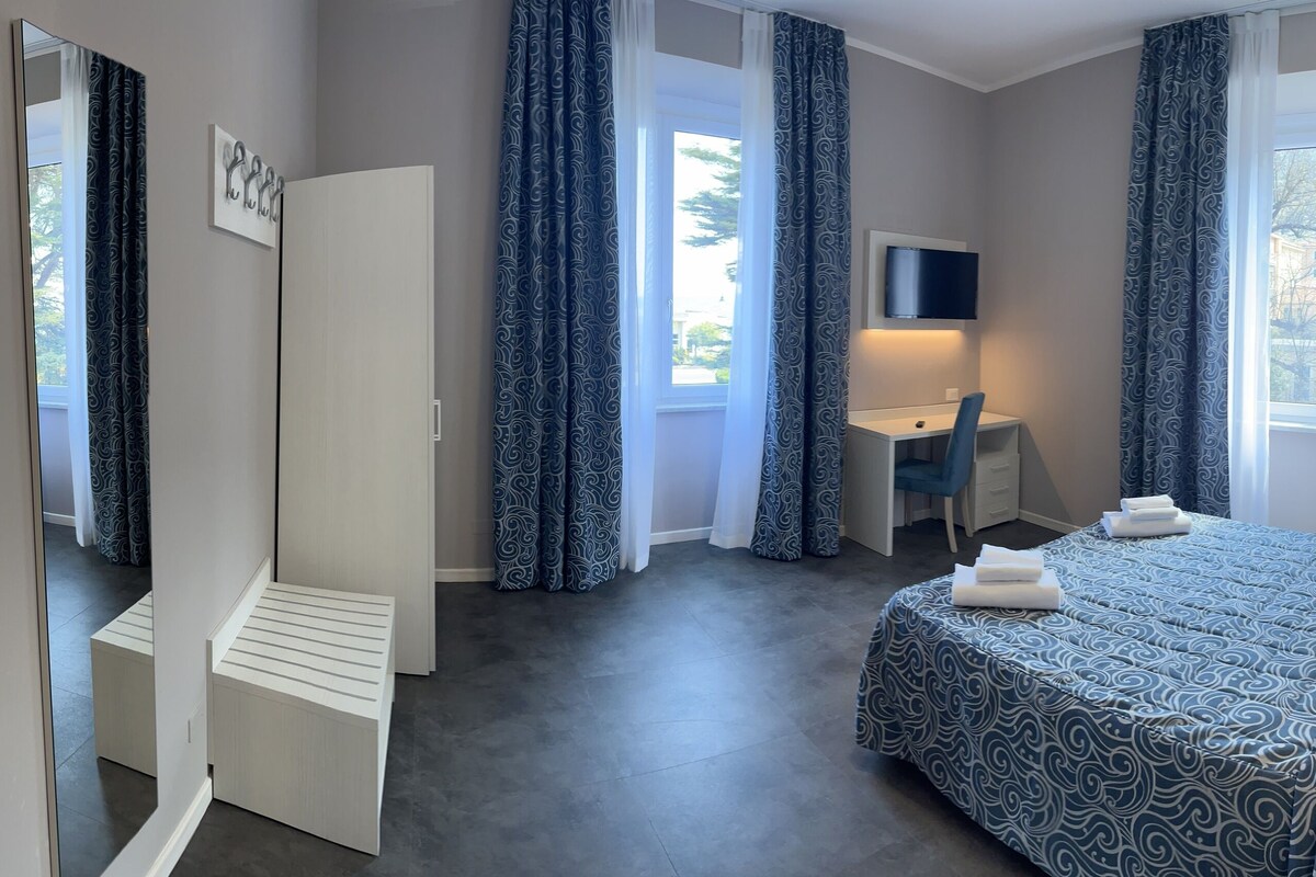 Double or Twin Room, Courtyard View | In-room safe, desk, free cots/infant beds, free rollaway beds