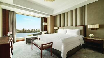 Executive Suite, 1 King Bed, River View | Premium bedding, down duvets, free minibar items, in-room safe