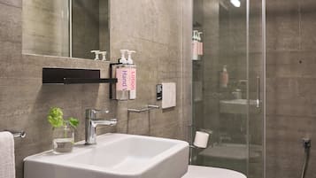 Shower, rainfall showerhead, designer toiletries, hair dryer