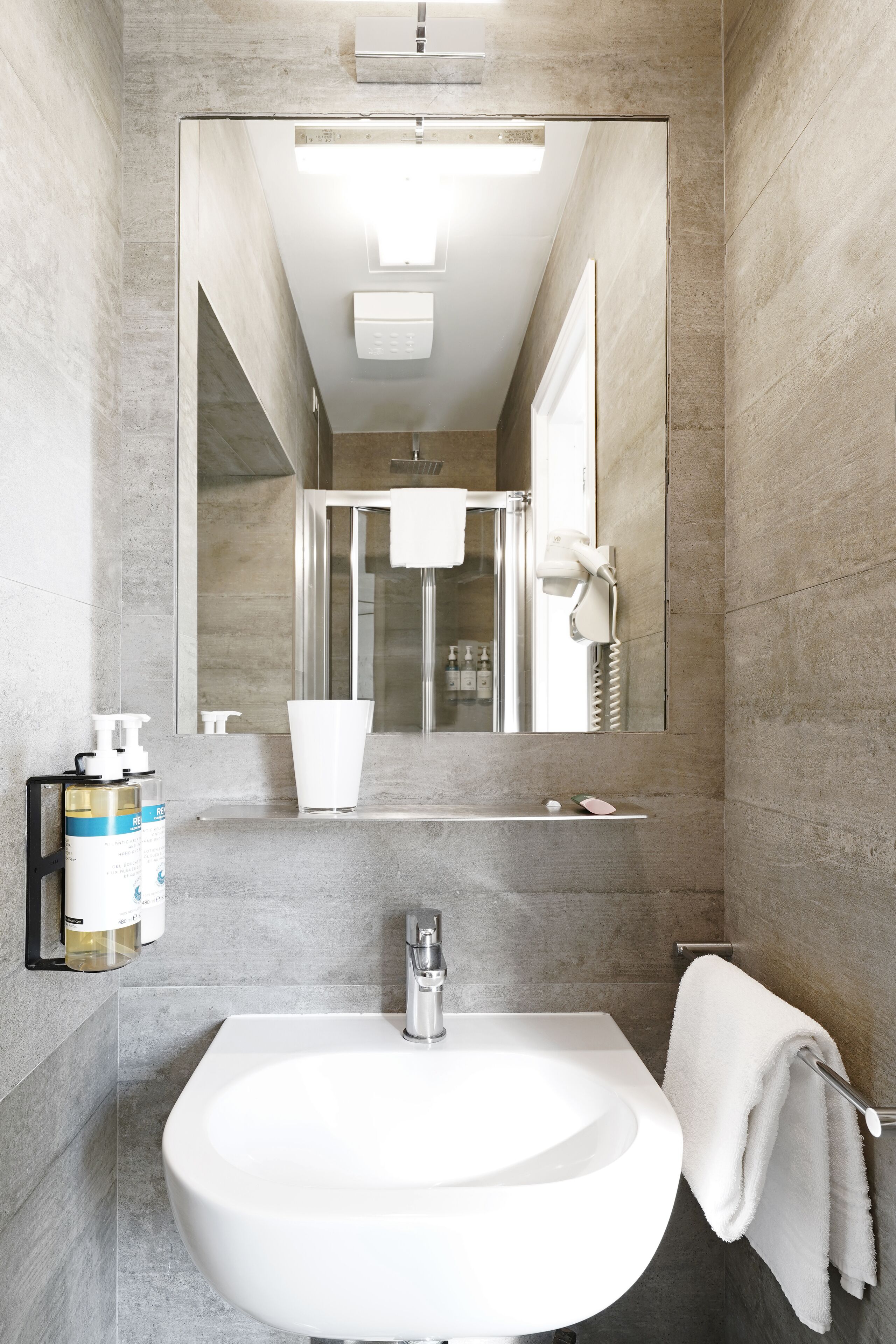 single room, 1 single bed (small room) | bathroom | shower, rainfall showerhead, designer toiletries, hair dryer