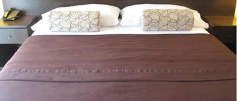 Hypo-allergenic bedding, down comforters, minibar, in-room safe
