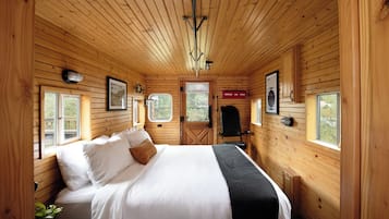 Habitación Deluxe, varias camas | Tabla de planchar con plancha, cunas gratuitas y wifi gratis
