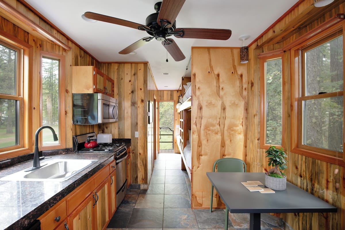 deluxe room, multiple beds | private kitchen | microwave