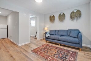 2 Bed Apartment with Balcony | Living area | 32-inch Smart TV with digital channels, table tennis, streaming services