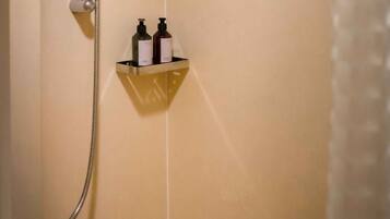 Shower, free toiletries, hair dryer, towels