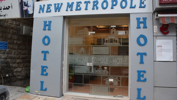A hotel named "New Metropole Hotel" with a clear signboard and a visible entrance. - New Metropole Hotel (Jerusalem)