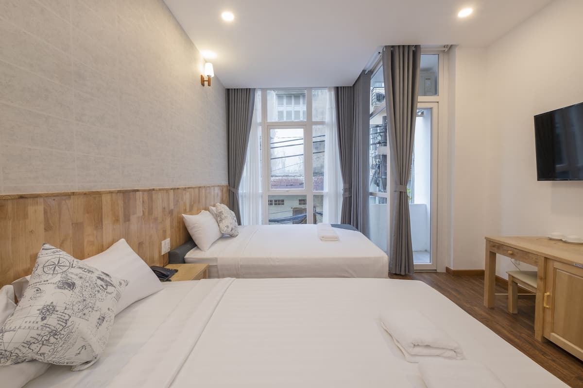 Deluxe-Vierbettzimmer | Schallisolierte Zimmer, kostenloses WLAN, Bettwäsche