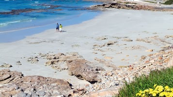 On the beach, white sand