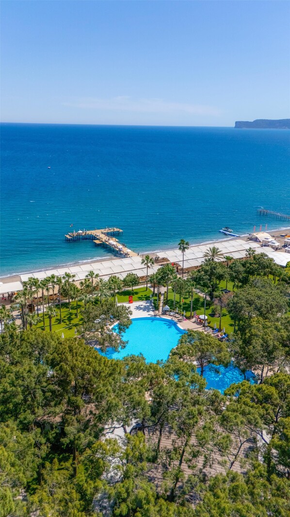 3 outdoor pools, pool umbrellas, pool loungers