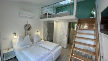 Standard Triple Room, City View | Down comforters, memory foam beds, desk, laptop workspace