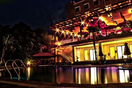 Outdoor pool, a waterfall pool. Padjadjaran Suites Resort & Convention
