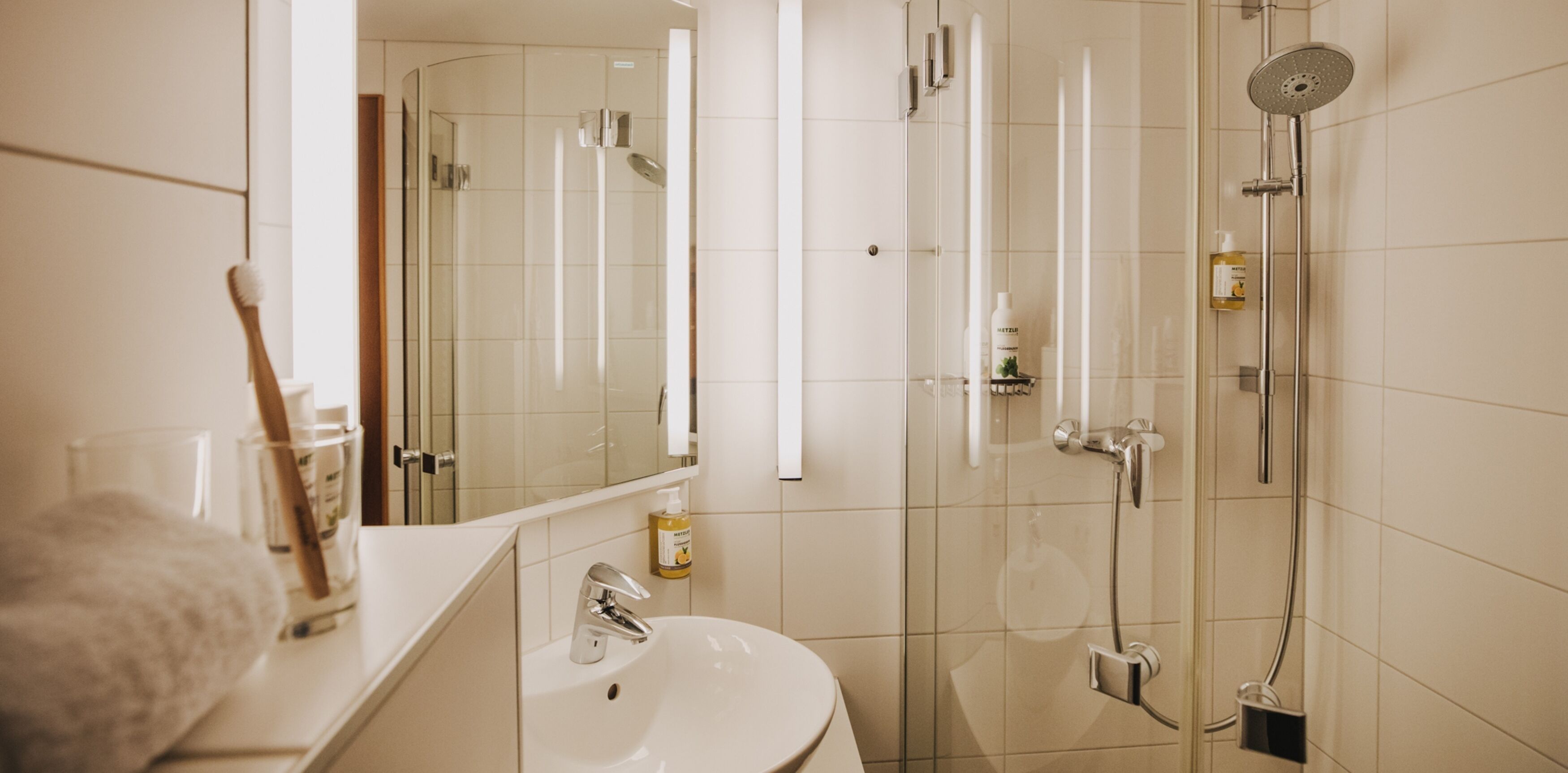 hair dryer, bathrobes, towels