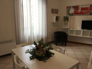 Apartamento, 1 quarto (max 3) | Área de estar | TV de tela plana