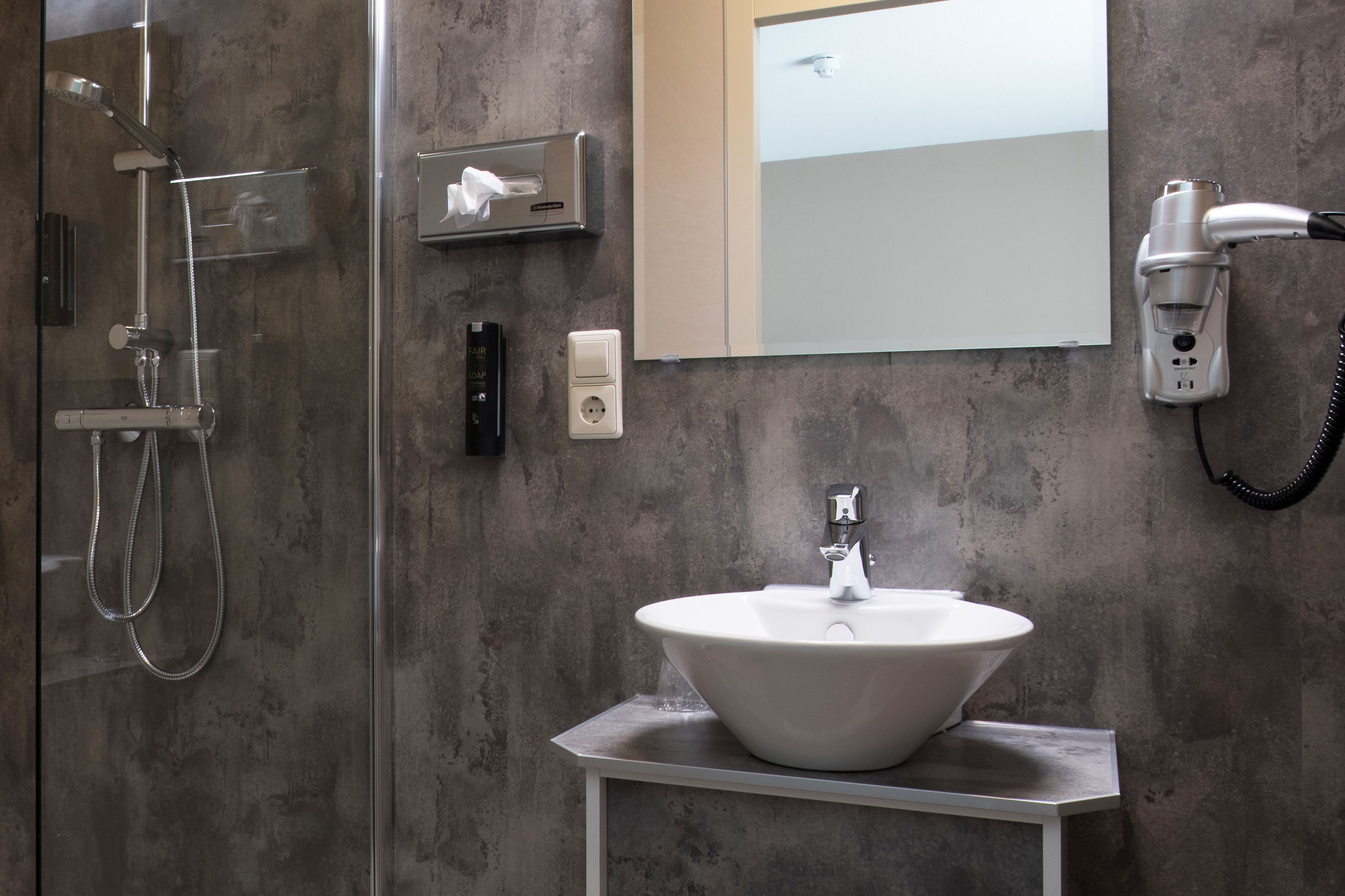 basic twin room | bathroom | free toiletries, hair dryer, towels