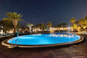 Outdoor pool, open 8 AM to 6 PM, pool umbrellas, sun loungers