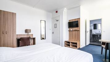 Desk, laptop workspace, blackout curtains, iron/ironing board