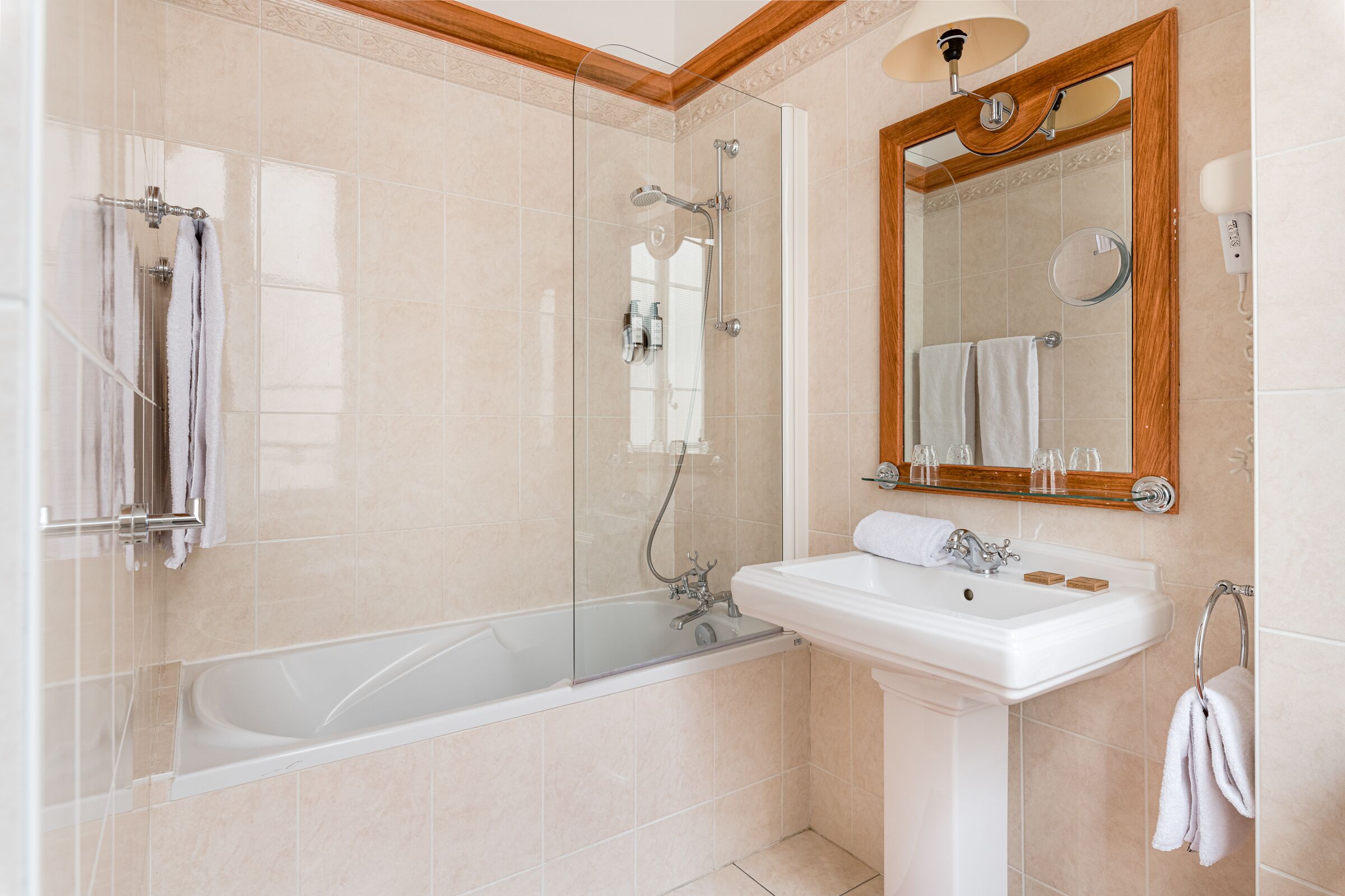 hair dryer, towels, soap, shampoo